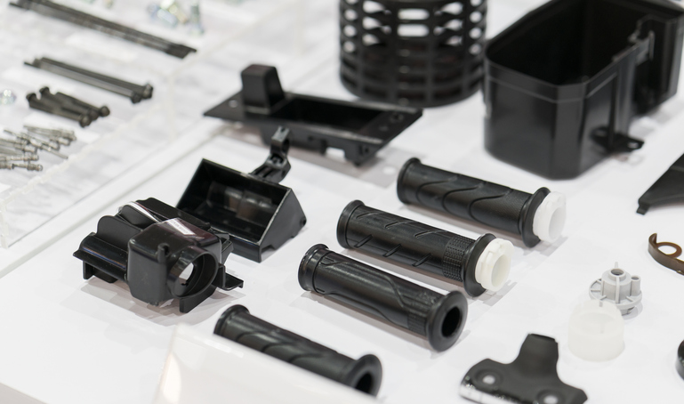 The kitting process in manufacturing helps organize kits and sub-assemblies, seen here as a collection of high precision aluminum, rubber, and plastic parts